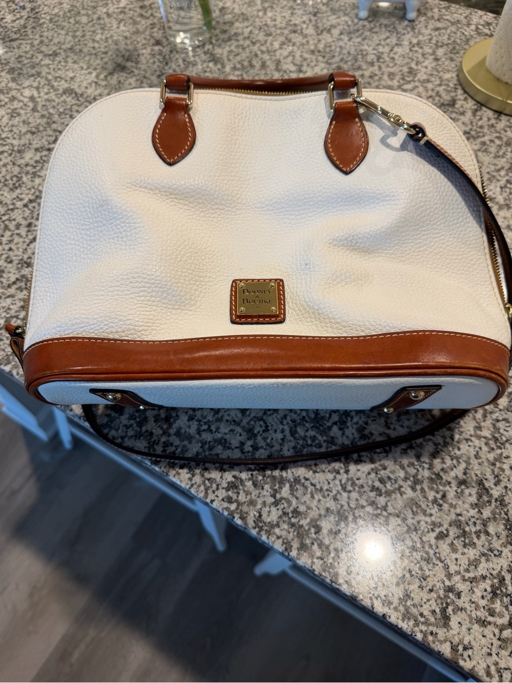 Dooney & Bourke White Pebbled Leather Satchel with Brown Trim
13” w
10” h